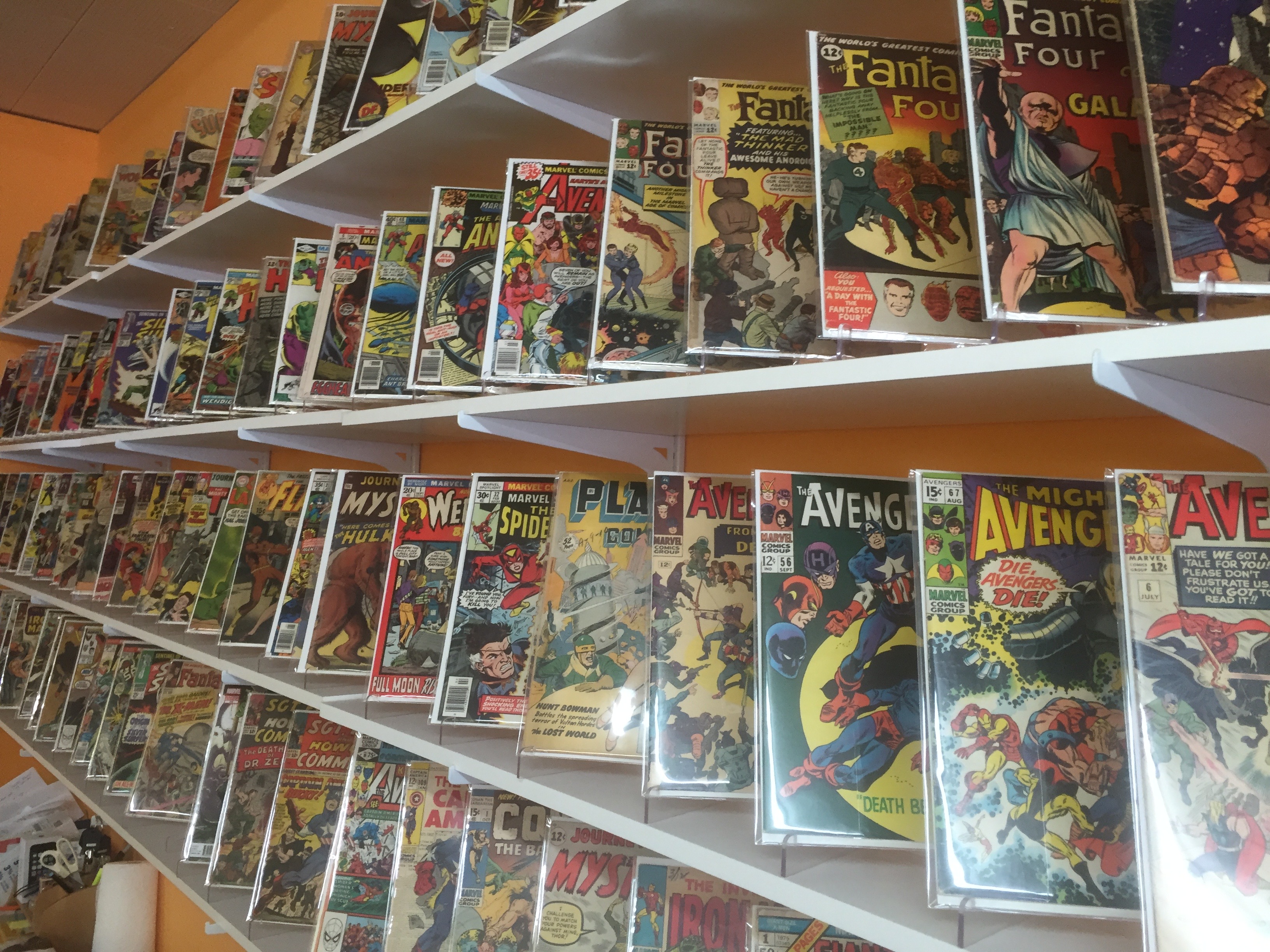 <span  class="uc_style_uc_tiles_grid_image_elementor_uc_items_attribute_title" style="color:#ffffff;">The Back Wall at Mammoth Comics</span>